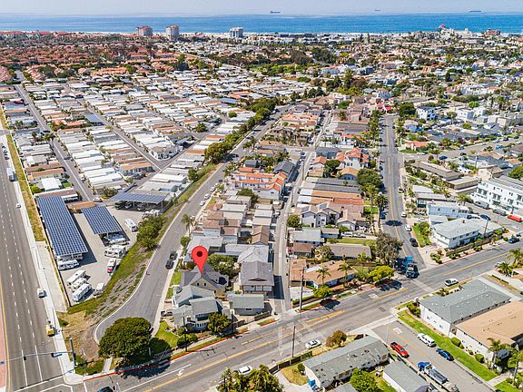 Located in the heart of Huntington Beach, less than a mile to the ocean with peek-a-boo views and comfortably beyond the downtown pursuits...