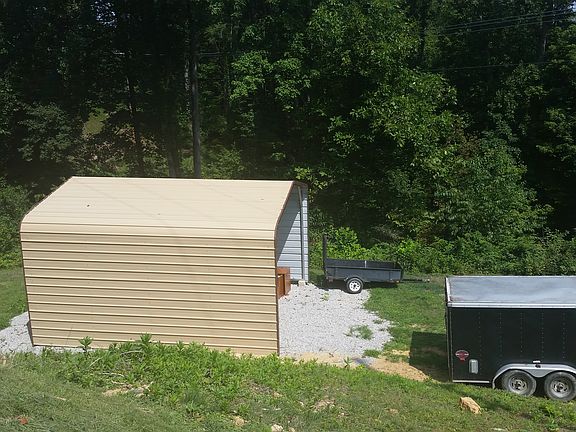 Double car carport with 9' w