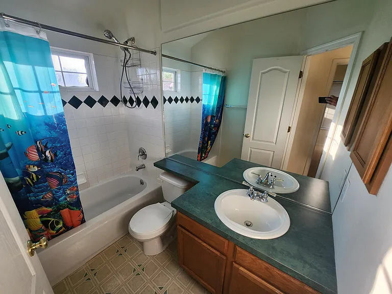 Upstairs bath accessed off the hall