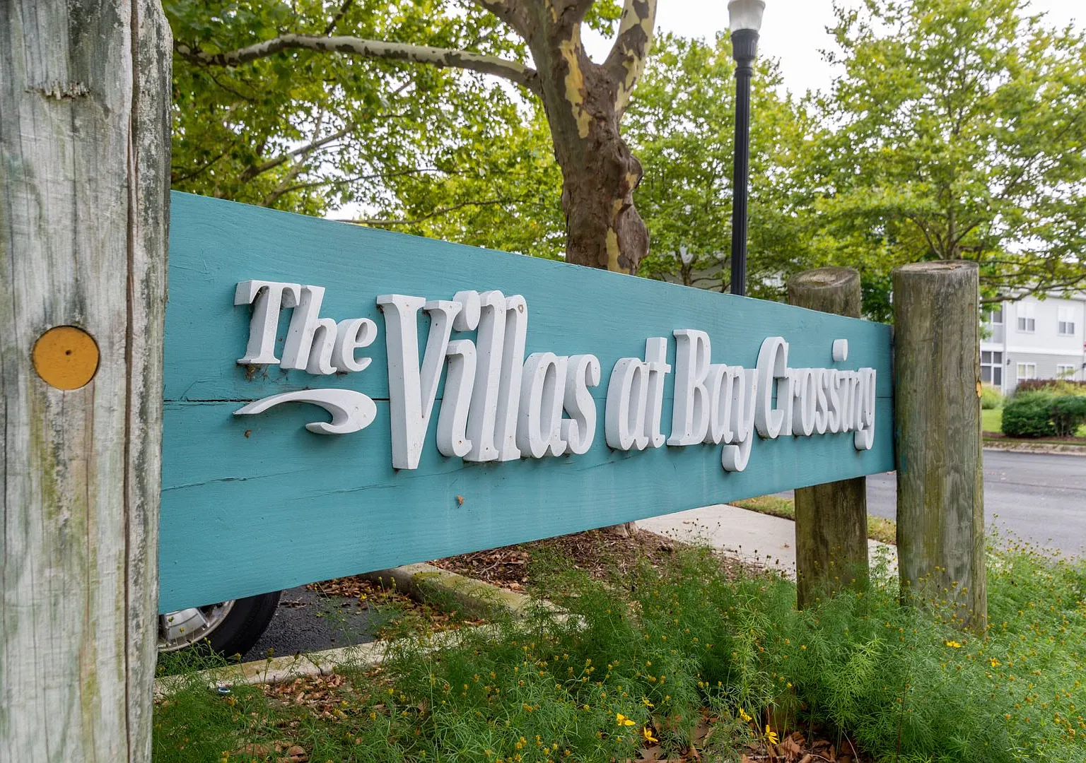 2nd floor condo in Villas at Bay Crossing with one car garage and community pool! — Photo 1