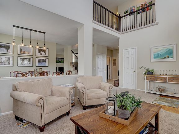 Front Room with stair case and over look
