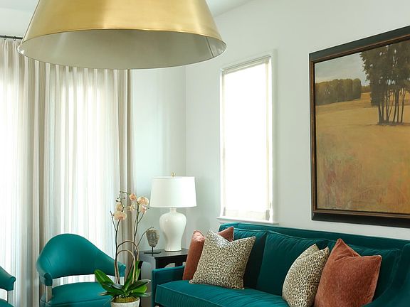 upscale window coverings and light fixtures throughout the home