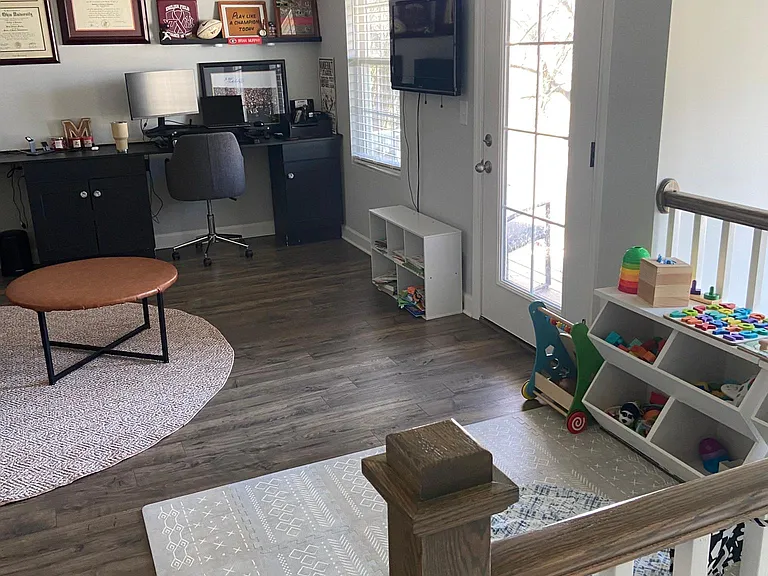 Bonus room / play area with mounted TV with Roku box