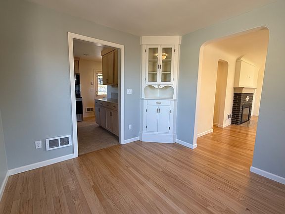 Dining room into kitchen (left) living room (right)