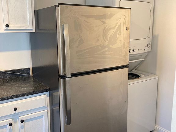 New refrigerator and Washer/Dryer Unit.