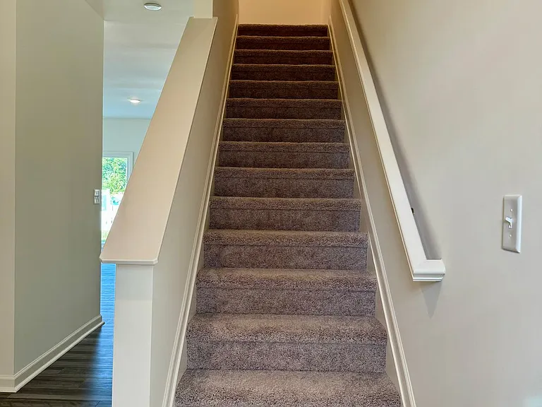 Stairway leading to the second floor.