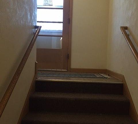 Main front hallway down to lower level