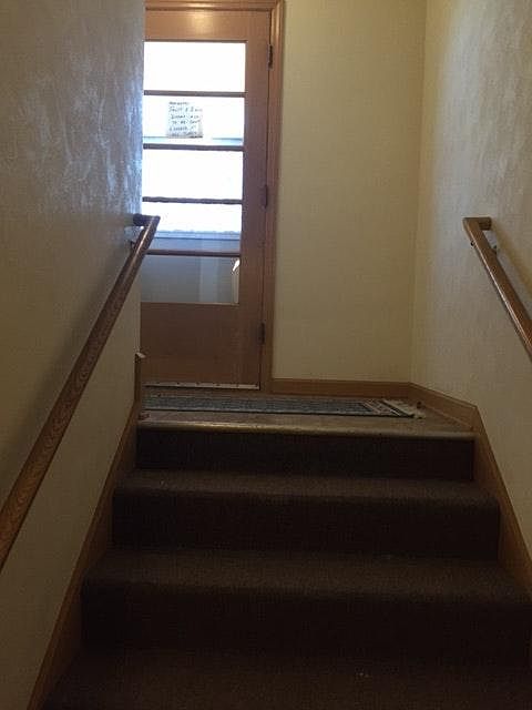 Main front hallway down to lower level