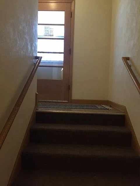 Main front hallway down to lower level