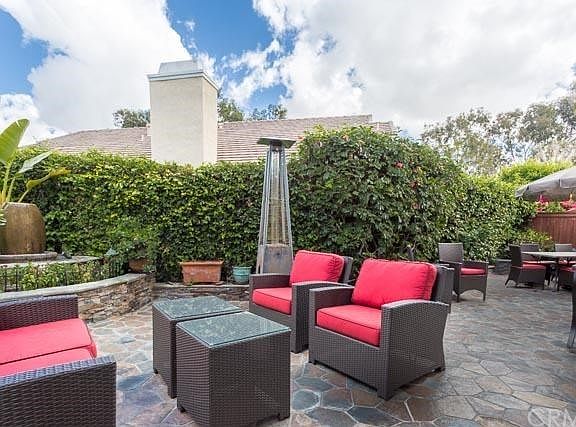 Mature landscaping, with water feature