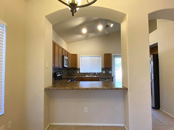 Dining Area, Open Kitchen, Vaulted Ceilings