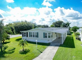 1001 Thrush Cir, Barefoot Bay, FL 32976