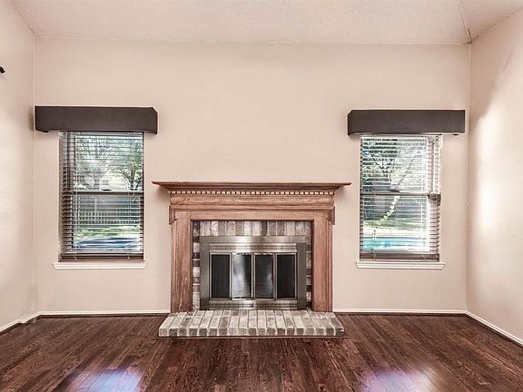 The fireplace has lovely mantel detailing!