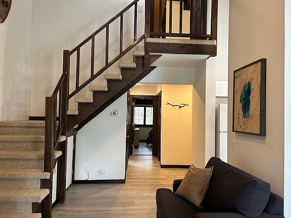 Open floor plan with new floors throughout the main level