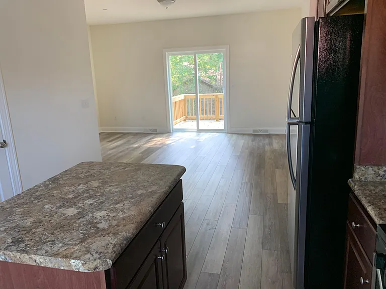 Kitchen looking to Living Rm