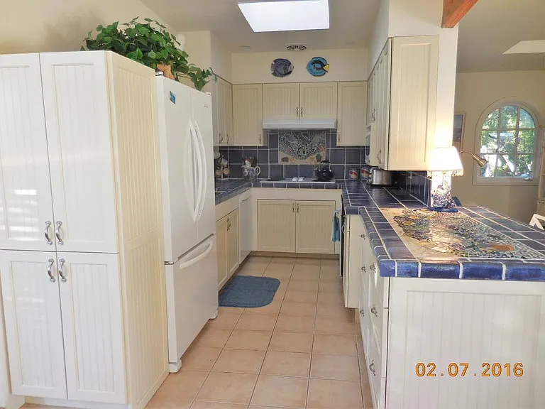 New kitchen with mosaic counter