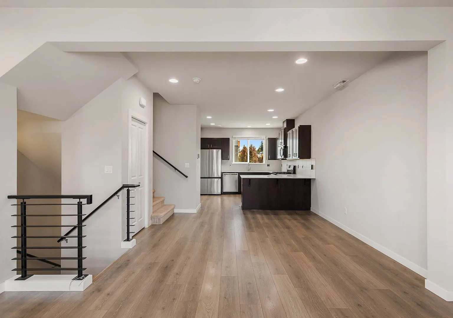 Modern Northshore Townhome with Designer Finishes & 2-Car Garage — Photo 3