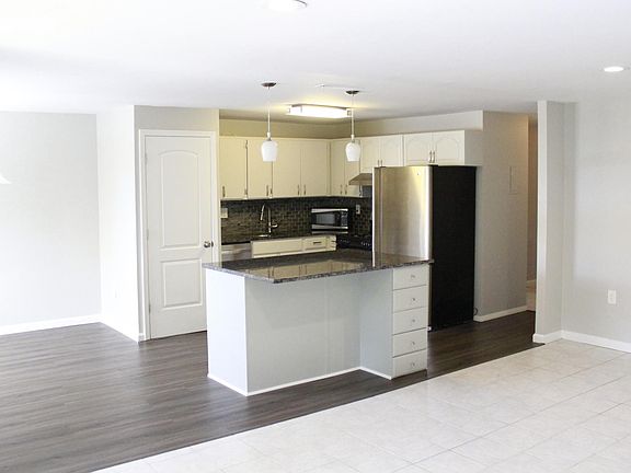 open living/dining/kitchen area