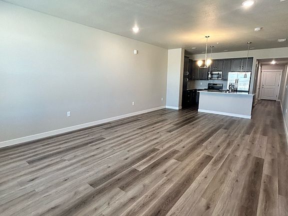 Living room, dining room and kitchen.