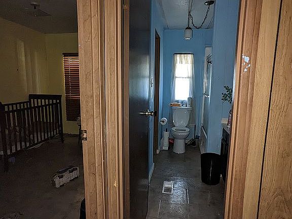 Hallway into main bathroom room