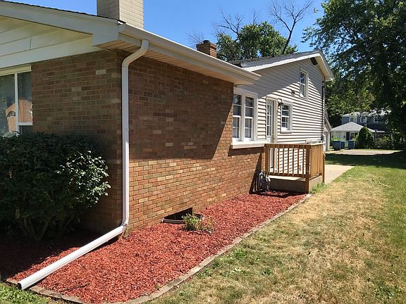 South side with kitchen exit door