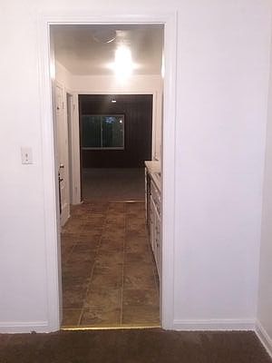 Dining Room to Kitchen to Family Room View