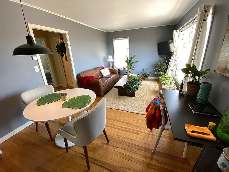 Large living/dinning room area with expansive view of SF Bay (former tenant furniture)