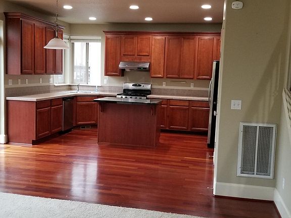 Kitchen integrated with family room and deck