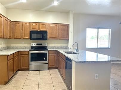 4th image of 9129 W Vernon Ave