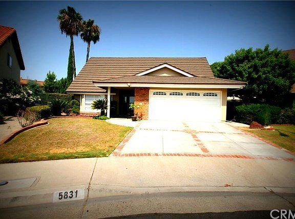 Brick accented home with low maintenance front yard