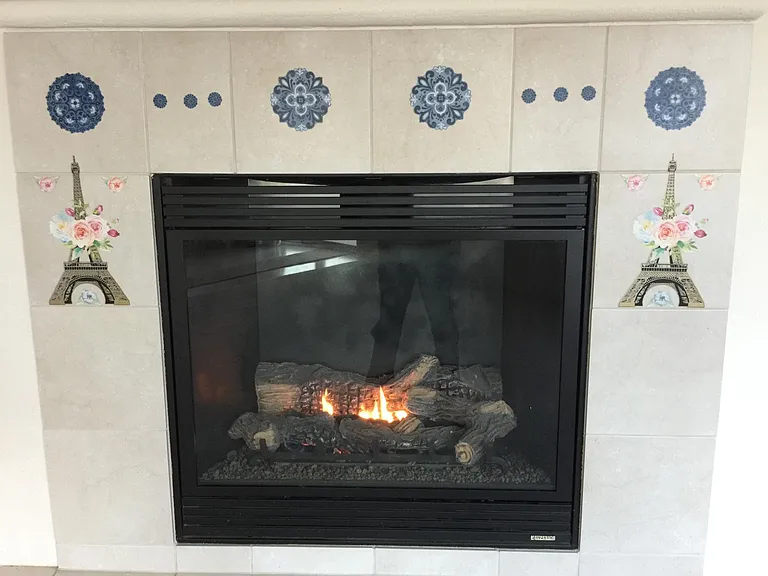 GAS BURNING AUTO FIREPLACE
