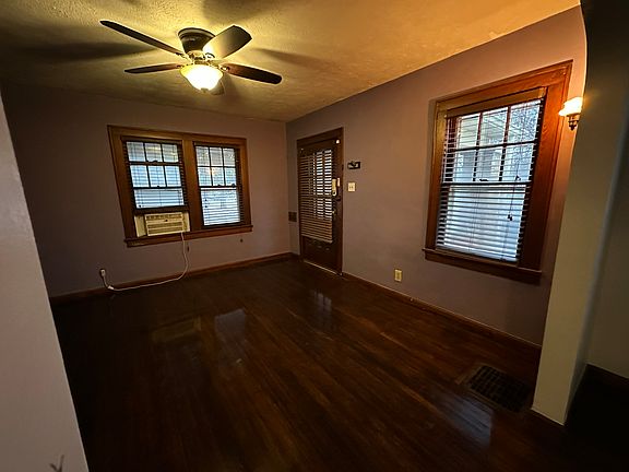 Cozy living room; hardwood floors throughout.