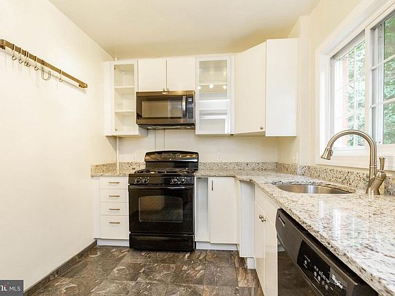 Updated Kitchen With Tile Floors