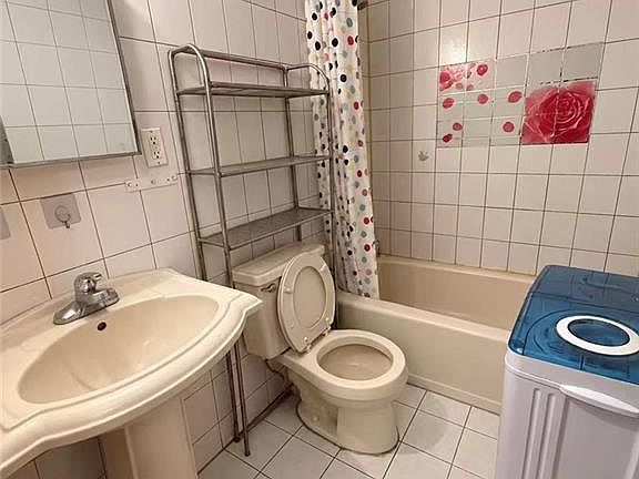 5th image of 668 56th St APT 3B