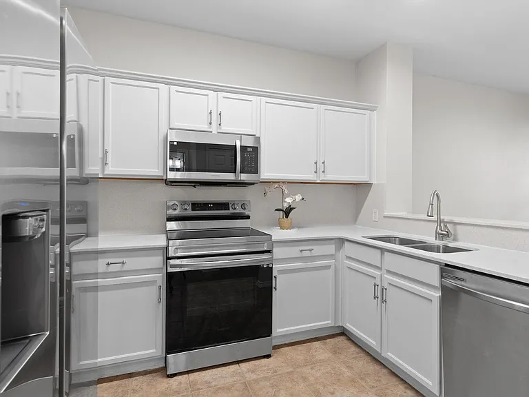 SS appliances are approximately 3.5 years old, NEW quartz countertops installed in 2026!