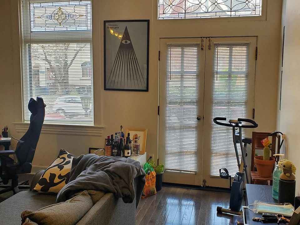 Living Room with Hardwood floors. French doors open to private, outdoor deck