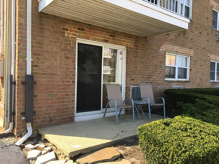 outside patio space for dining and relaxing with coffee or a glass of wine