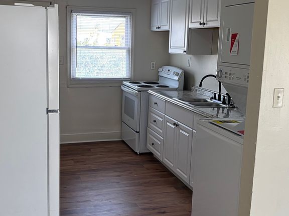 New cabinets, New flooring, New washer and dryer. Includes refrigerator and stove