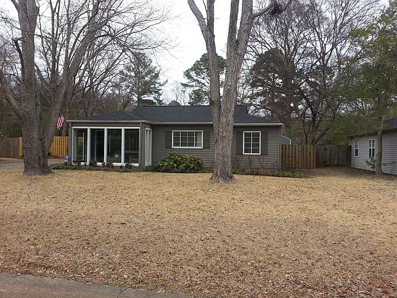Front with Large Oak trees