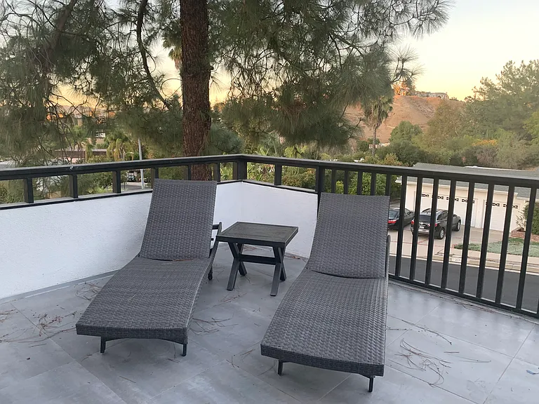 upstairs balcony with chaise lounges, mountain view and privacy