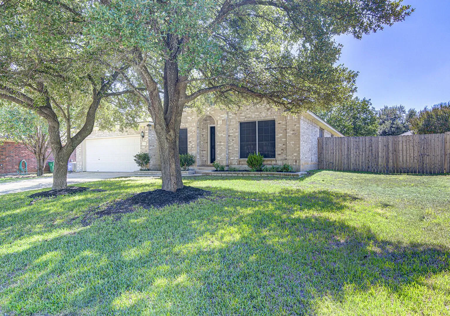 Beautifully Refreshed 3 Beds and 2 Baths Cedar Park Home with Brand New Flooring & Spacious Backyard — Photo 2