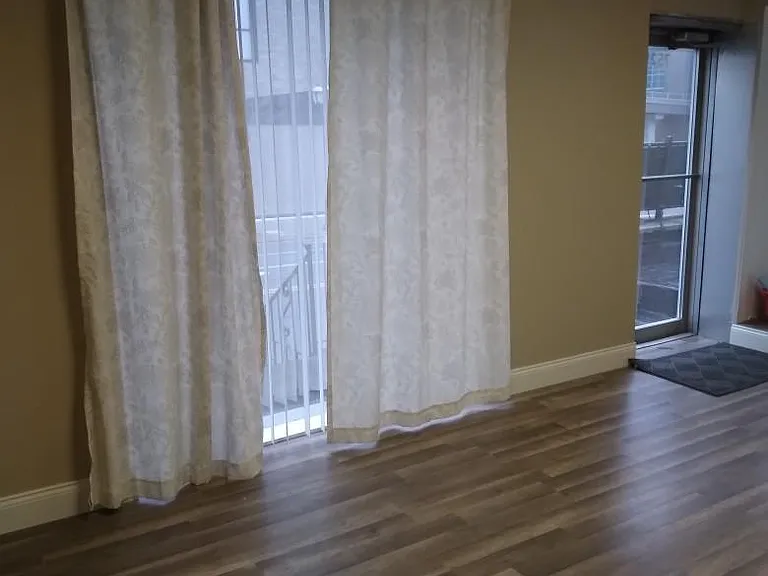 Front Room with large glass window and glass door which provides plently of ample light.