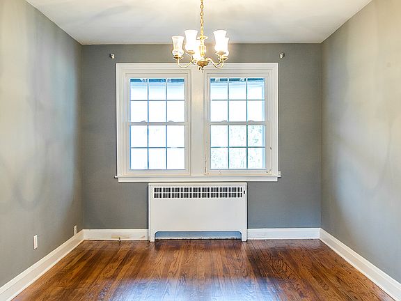 Beautiful Hardwood floors in your freshly painted Dining Roo