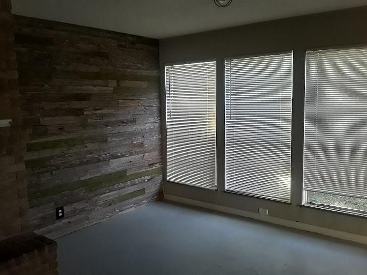 Living room downstairs over looking back yard.