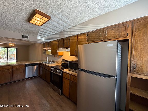 3rd image of 11659 DUNES WAY Drive N