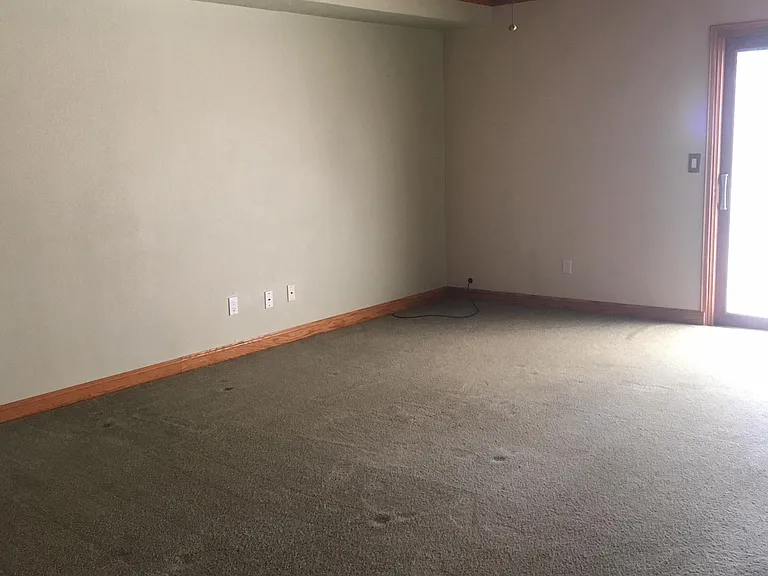 Living Room area with sliders to patio