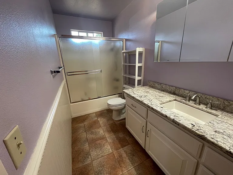 Primary Bathroom with shower/tub combination.
