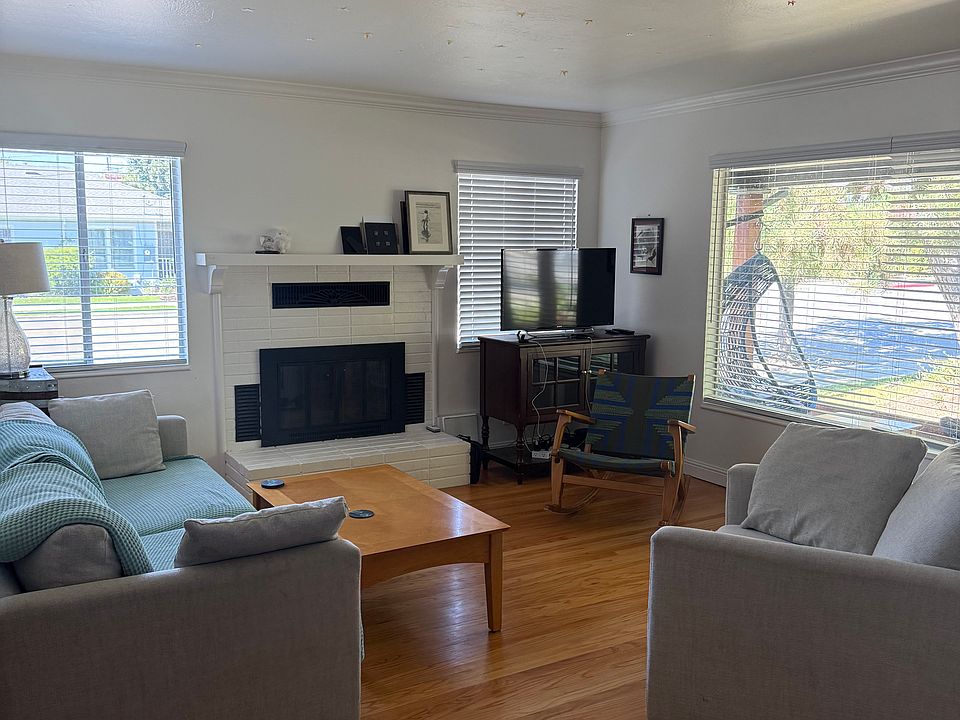 Beautiful hardwood floors and a cozy fireplace.