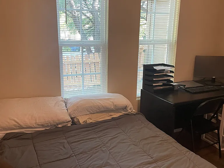 Downstairs bedroom has lots of closet space including shelving unit. Has its own downstairs bathroom.