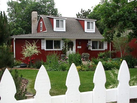 Summer Through the Picket Fence